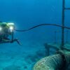 Neutrally Buoyant ROV Tether Cable Underwater Inspection Application Neutrally buoyant ROV tether cable connecting an underwater inspection vehicle near subsea piping