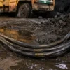 Type G Mining Cable connected to underground mining equipment in a wet mine environment