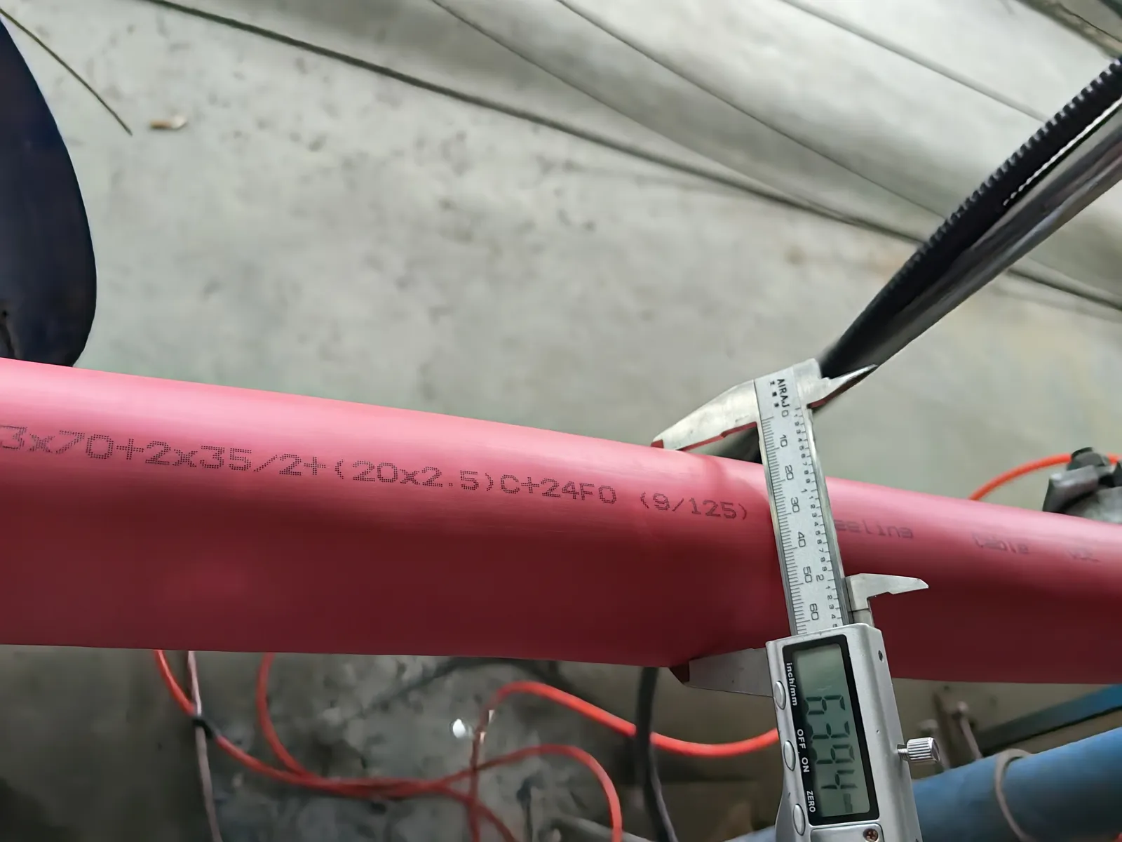 Caliper reading 63.94 mm on the 3x70 + 2x35/2 reeling cable, tender window 62 to 65 mm