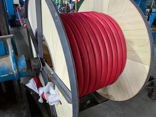 Finished 8.7/15 kV reeling cable wound onto a wooden shipping drum