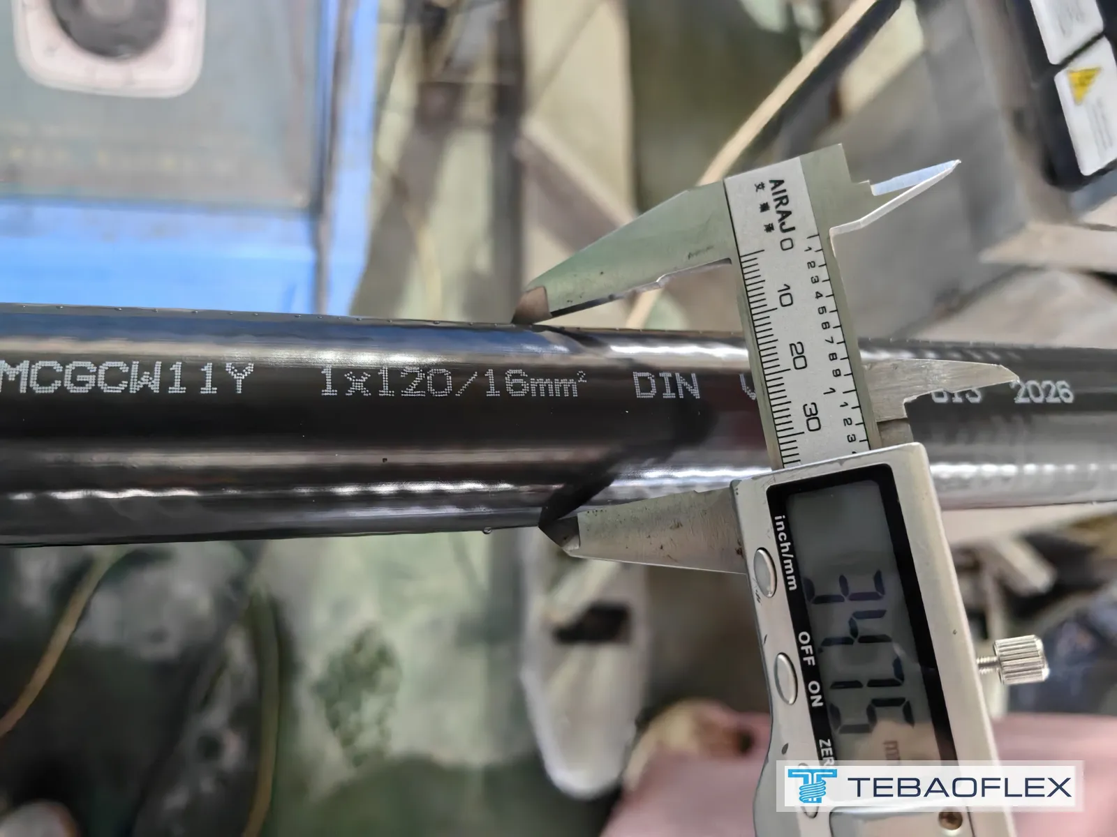 Caliper reading 34.75 mm with (N)TMCGCW11Y 1x120/16 sheath print and 2026 year marking