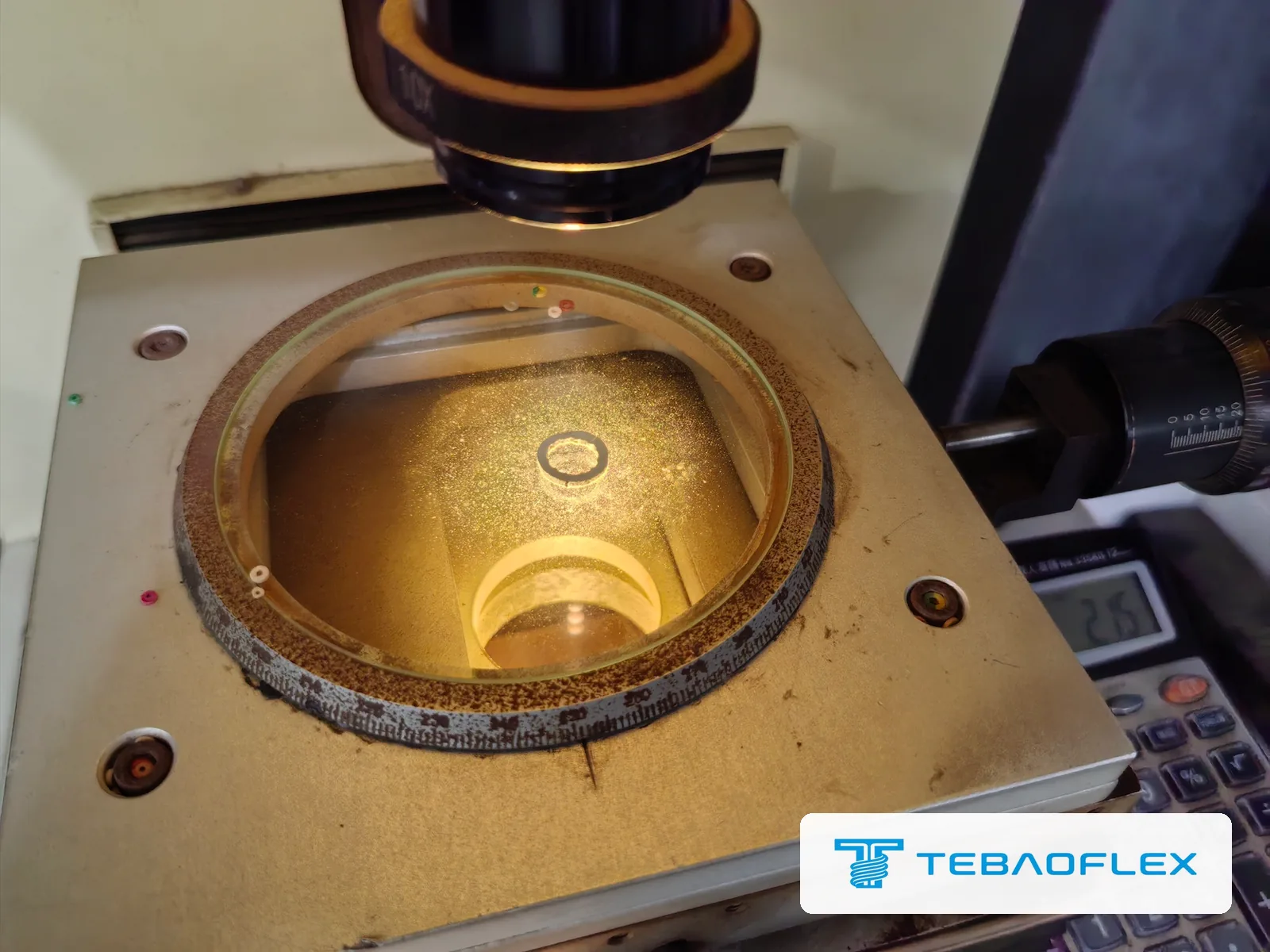 Cable slice on the measuring projector used for insulation and sheath thickness checks