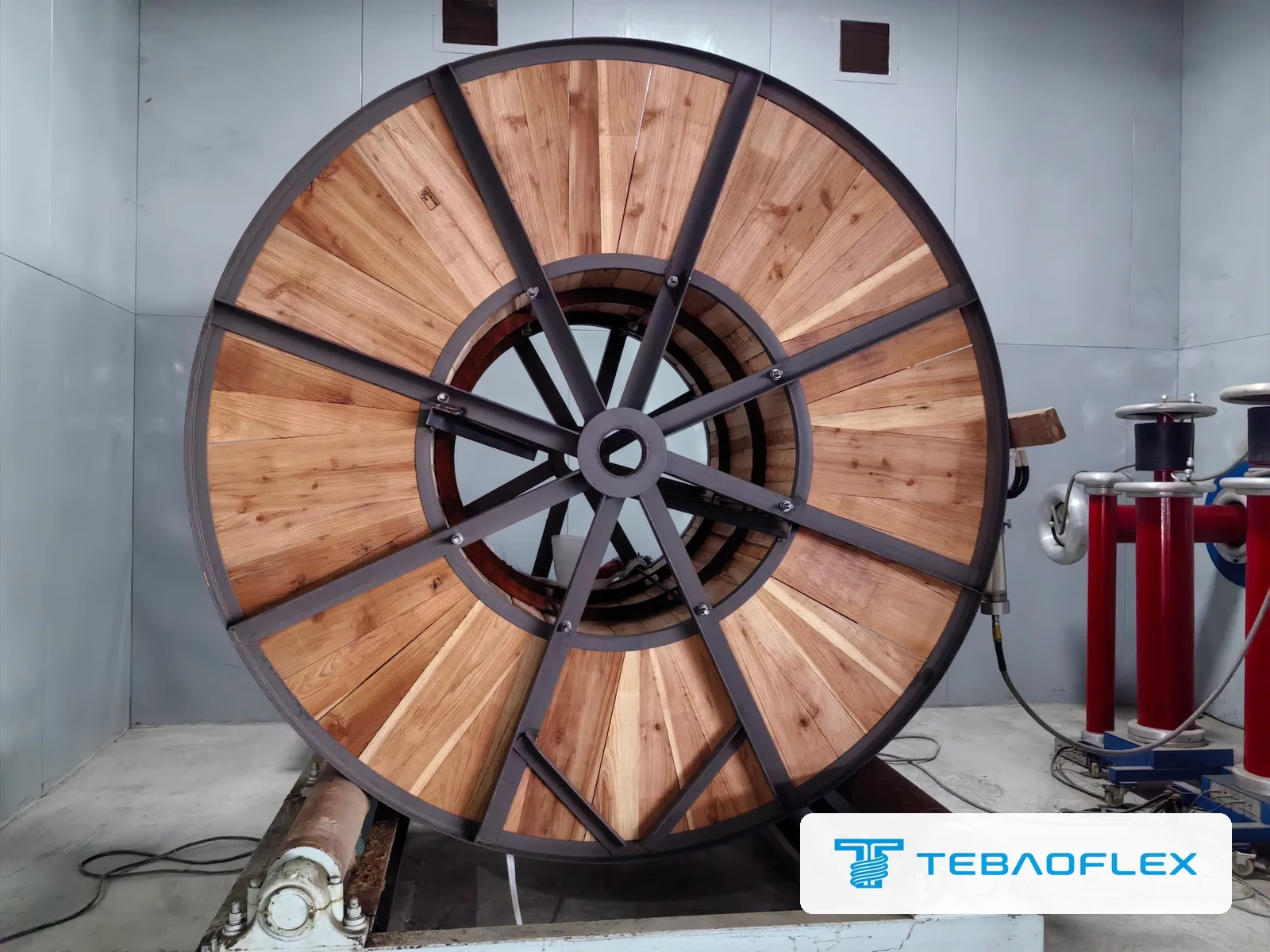 Finished drum of 12/20 kV reeling cable on the stand inside the shielded partial discharge test room