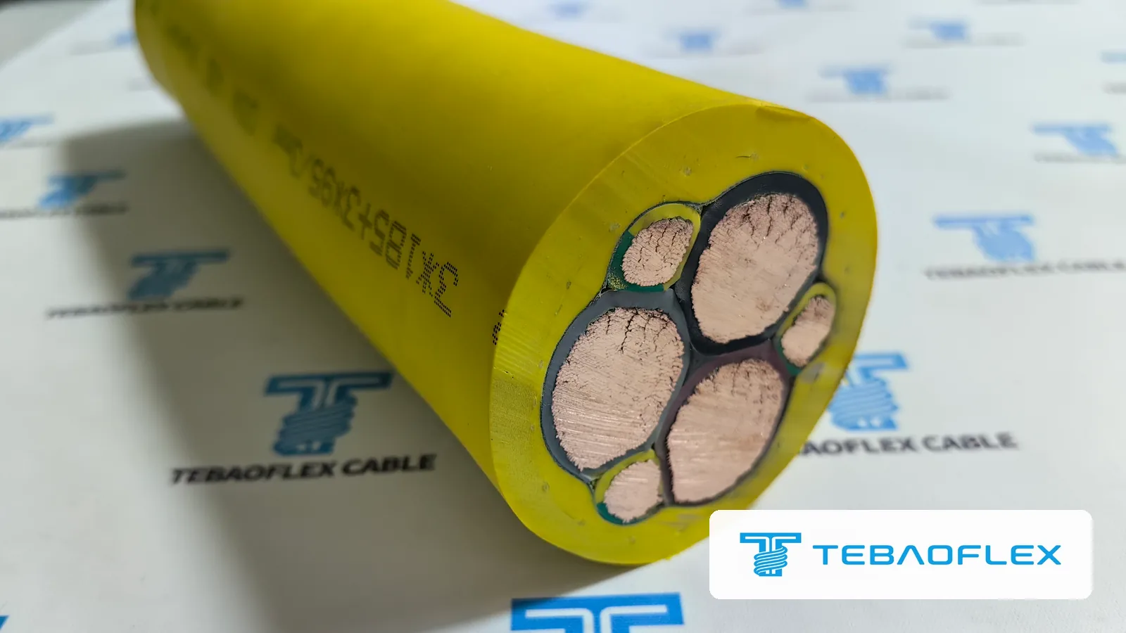 (N)SHTÖU-J 3×185+3×95/3 reeling cable cut end: tinned copper cores in a yellow PCP sheath