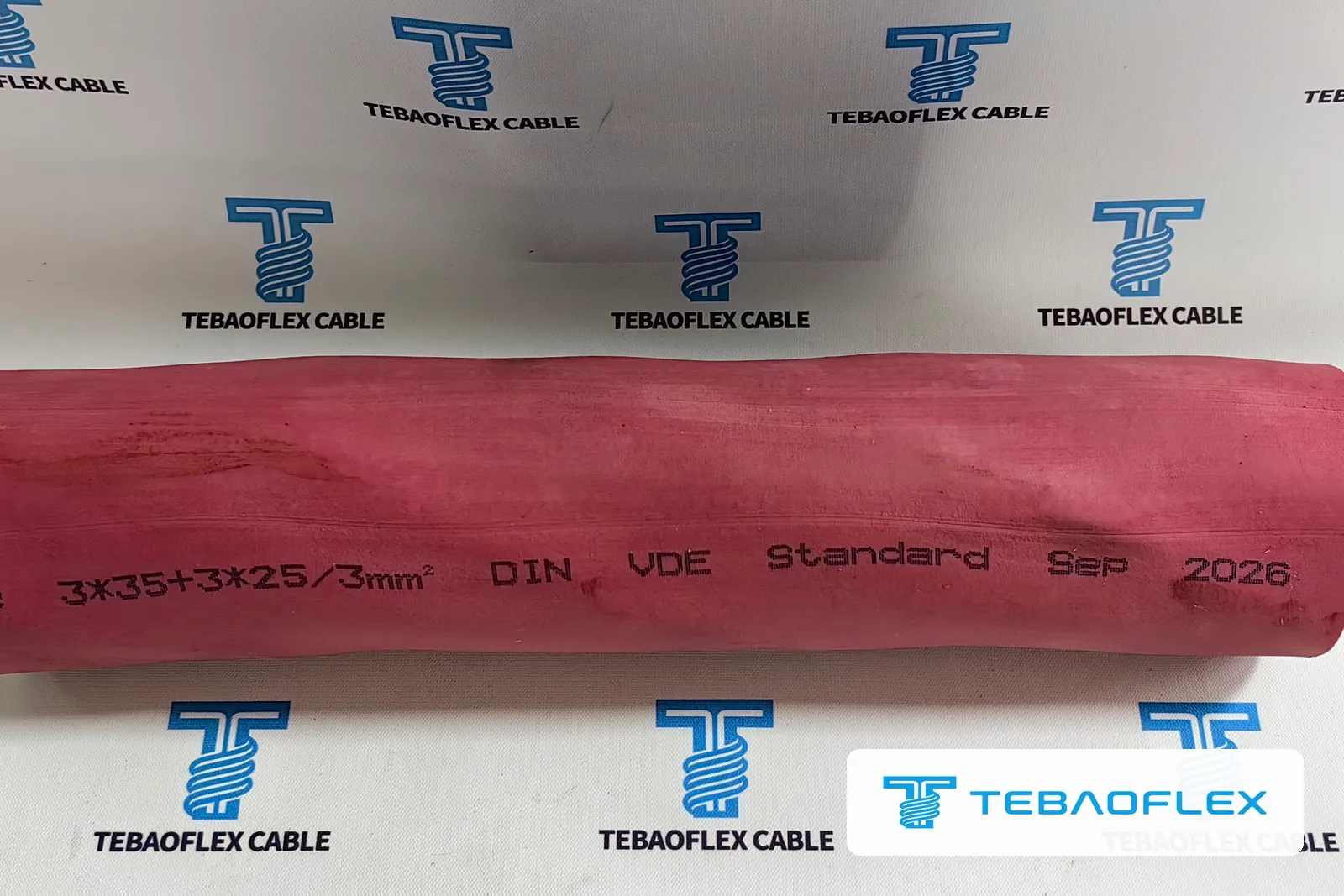 Red sheath of the reeling cable with the inkjet print 3*35+3*25/3mm² DIN VDE Standard Sep 2026